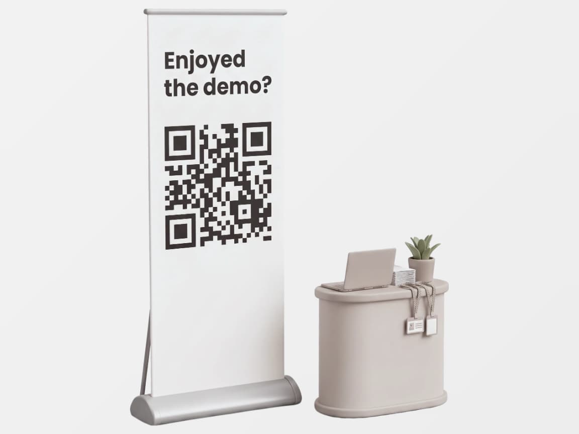 Printed QR code and two phones showing the survey before and after an edit